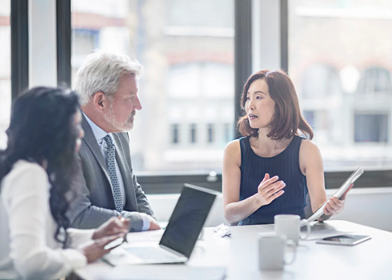 An international team discusses with an interpreter