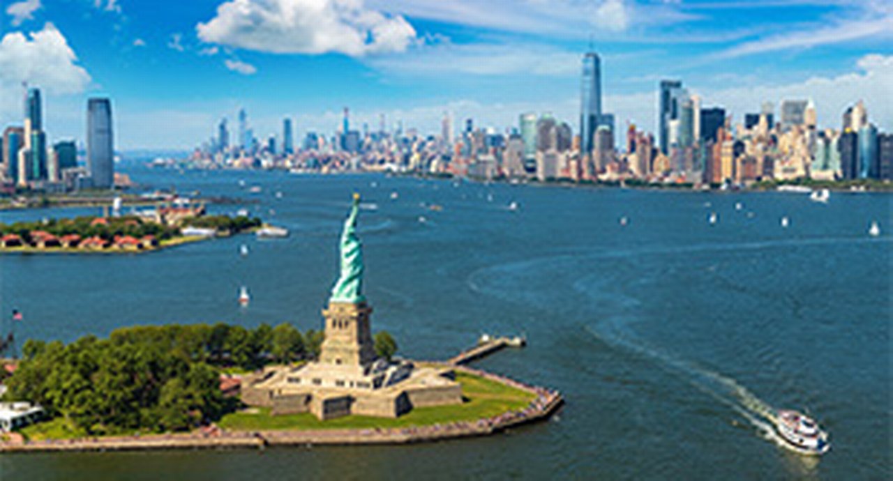 Statue of Liberty with the New York skyline in the background