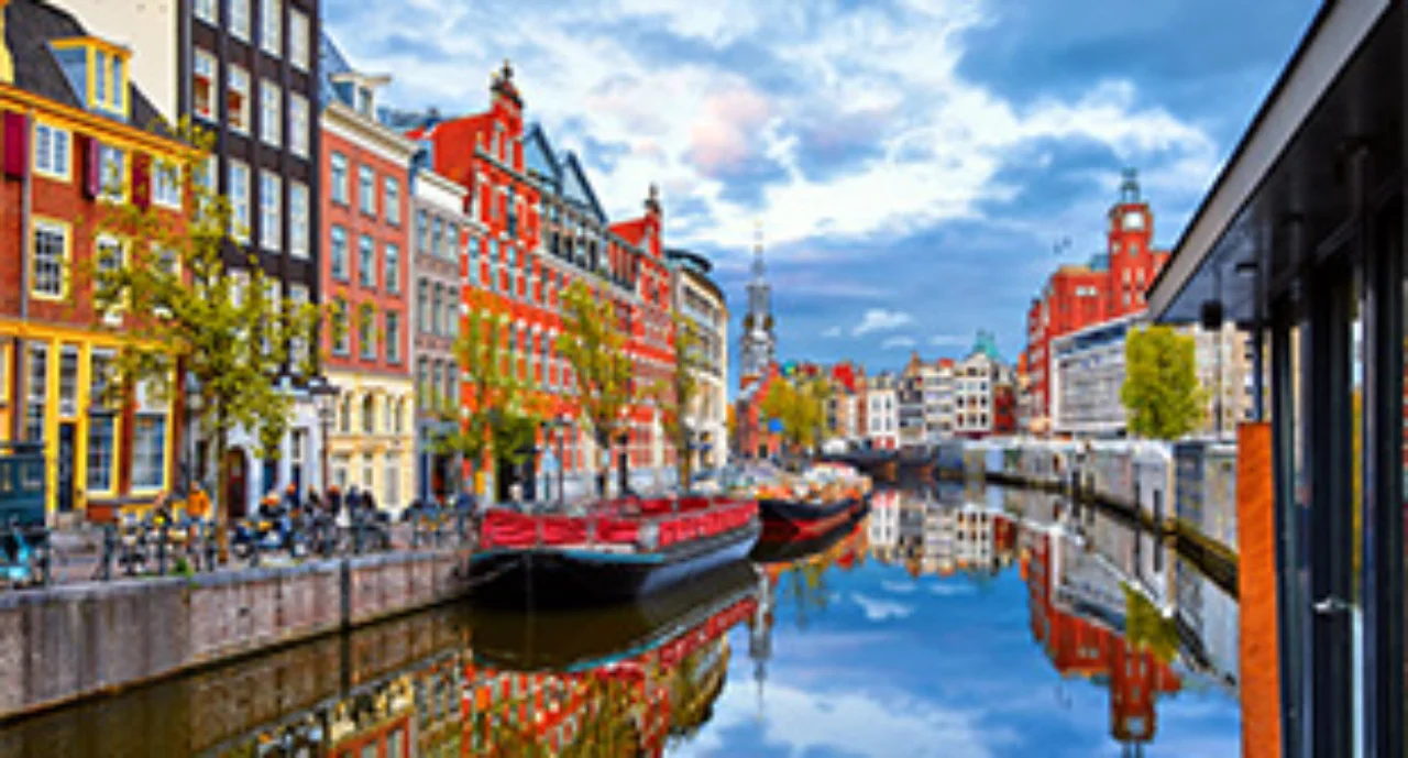 Amsterdam water way with buildings on both sides