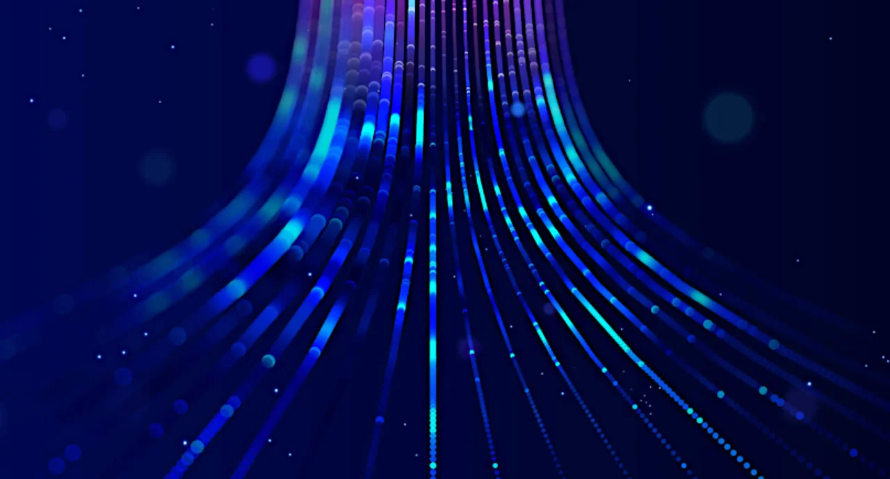 Flowing blue light trails on a dark background symbolizing digital data streams