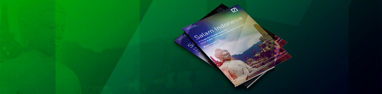 Two books on a green background