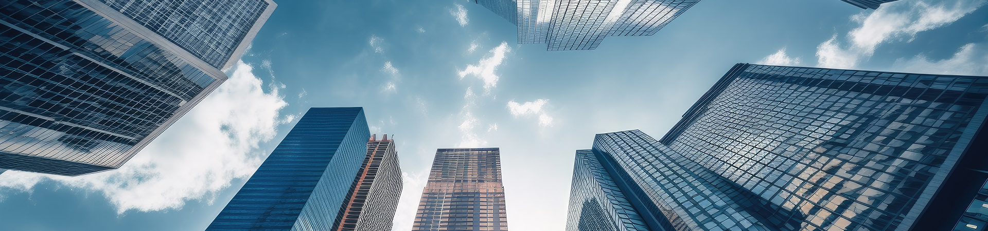 View of tall city buildings from below