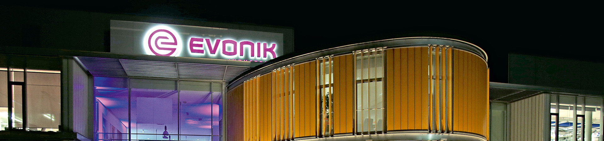 Evonik building lit up at night